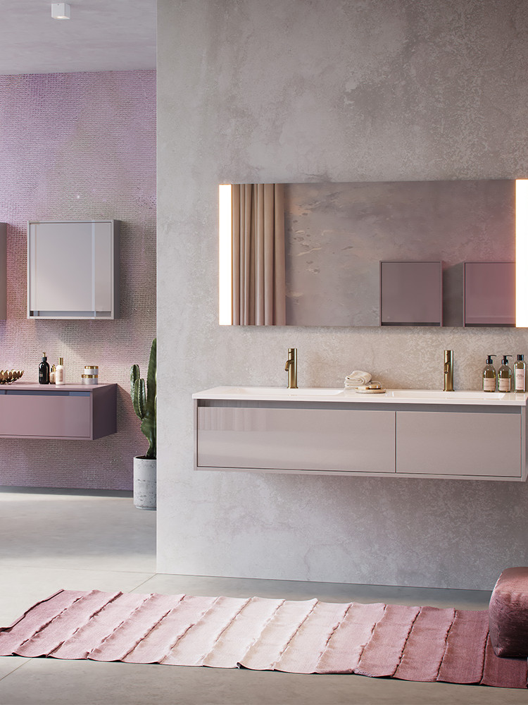 Meuble de salle de bains suspendu avec double vasque, grand miroir ovale et éclairage suspendu dans une salle de bains contemporaine illustrant la hauteur idéale d’un meuble vasque