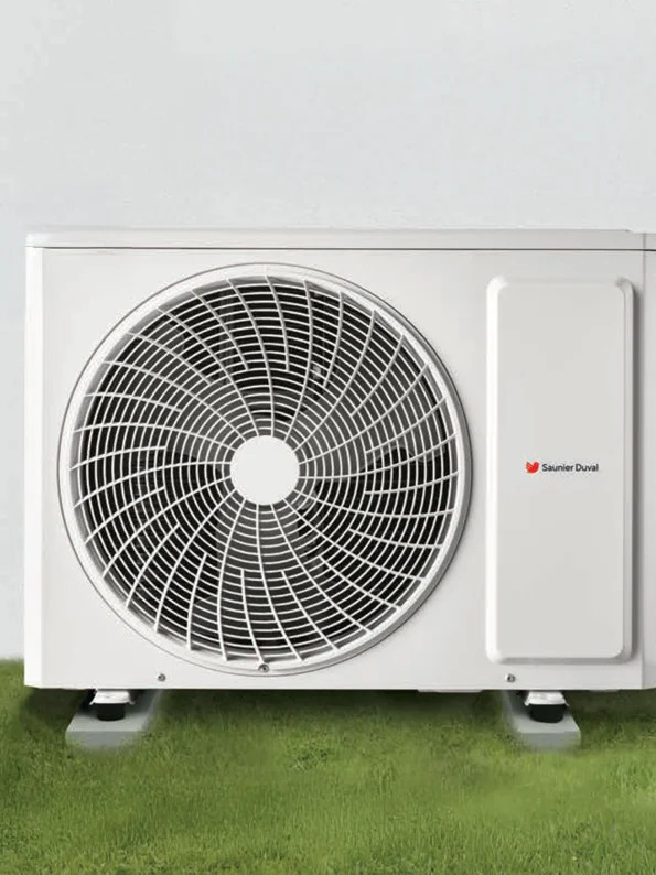 Outdoor unit of a reversible heat pump installed in a garden