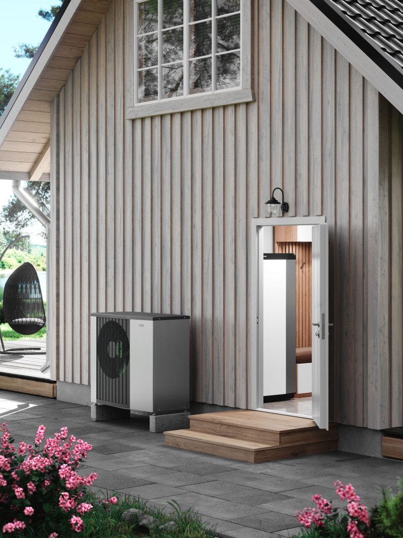 Heat pump installed outside a detached house