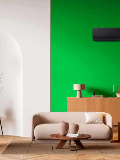 Heat pump installed indoors in a living room for year-round operation.